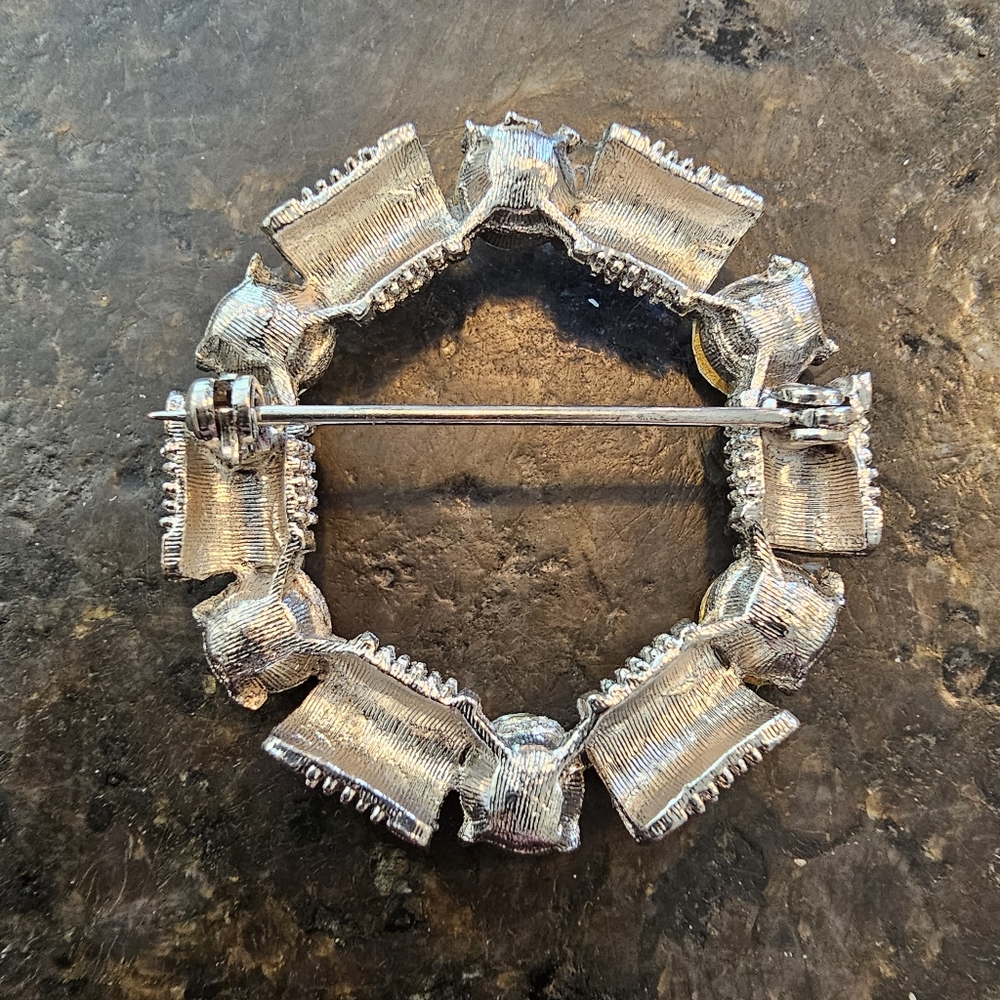Vintage silvertone and rhinestone circular brooch - Picture 2 of 4